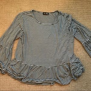 Francesca’s Three-Quarter Sleeve Peplum Top!